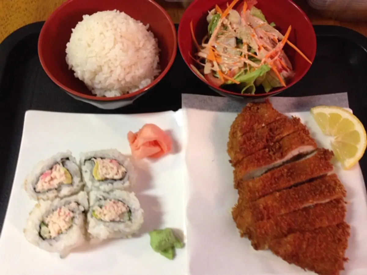 Kitchen-Aloha-Japanese-restaurant-Sushi-Cutlet-Set-San-Francisco Set meal with sushi rolls, breaded cutlet, salad, rice, pickled ginger, and lemon at Kitchen Aloha Japanese restaurant in San Francisco