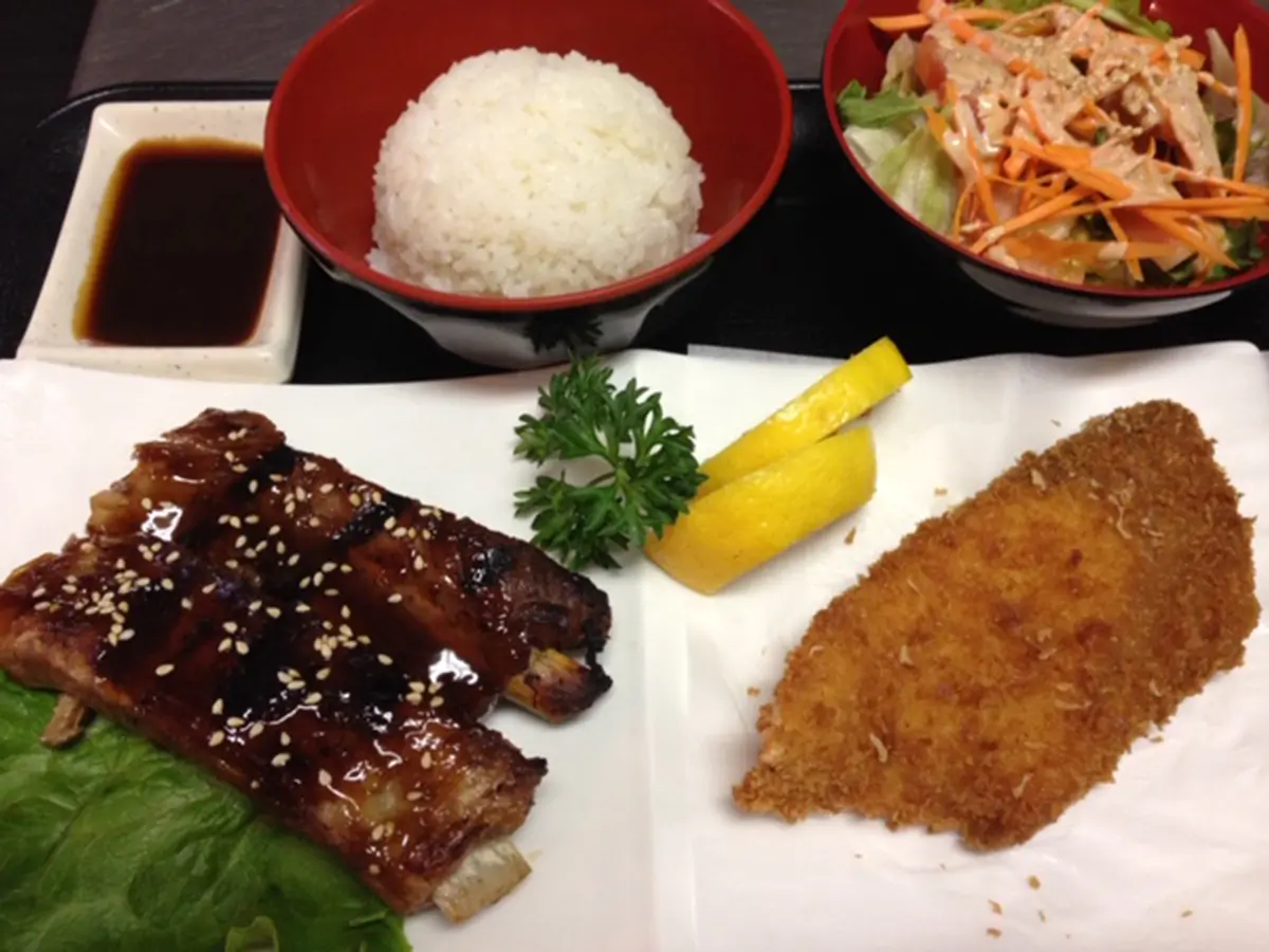 Kitchen-Aloha-Japanese-restaurant-Rib-Cutlet-Set-San-Francisco Set meal with glazed ribs, breaded cutlet, salad, rice, sauce, and lemon at Kitchen Aloha Japanese restaurant in San Francisco